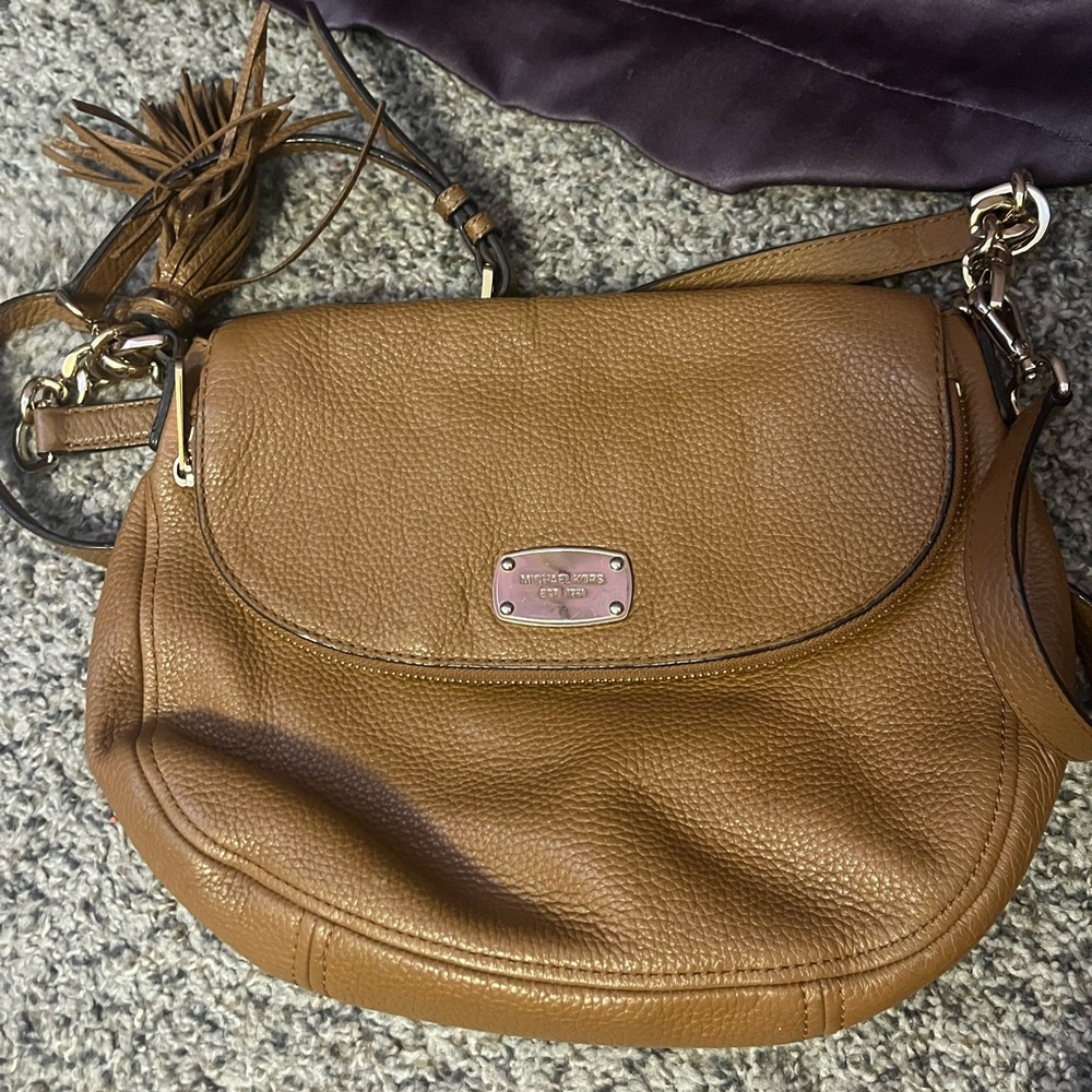 Michael Kors Bradford flap pebble soft leather zipper with side tassel
